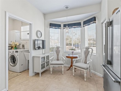 Fabulous Golf Course home with a GOLF CART GARAGE! Welcome to on Ocala Palms Golf and Country Club in Florida - for sale on GolfHomes.com, golf home, golf lot