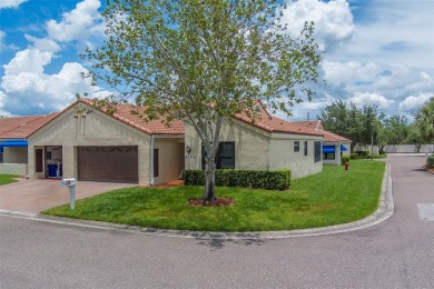 Welcome home to this light and airy 2 bedroom/2 bathroom corner on Mainlands Golf Club in Florida - for sale on GolfHomes.com, golf home, golf lot