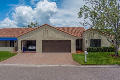 Welcome home to this light and airy 2 bedroom/2 bathroom corner on Mainlands Golf Club in Florida - for sale on GolfHomes.com, golf home, golf lot