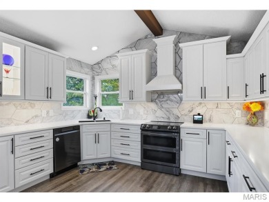 Not only will you get this spectacular home, but the lot next on Raintree Country Club in Missouri - for sale on GolfHomes.com, golf home, golf lot