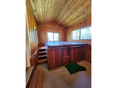 This lovely three-bedroom 2 bath home located in a desirable on Cabinet View Country Club in Montana - for sale on GolfHomes.com, golf home, golf lot