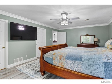 Not only will you get this spectacular home, but the lot next on Raintree Country Club in Missouri - for sale on GolfHomes.com, golf home, golf lot