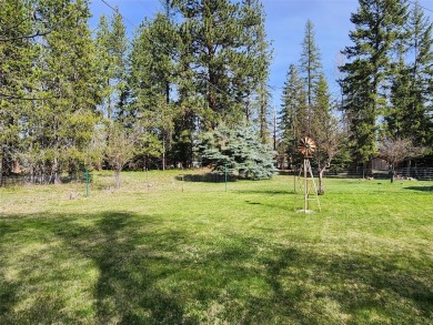 This lovely three-bedroom 2 bath home located in a desirable on Cabinet View Country Club in Montana - for sale on GolfHomes.com, golf home, golf lot