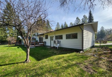 This lovely three-bedroom 2 bath home located in a desirable on Cabinet View Country Club in Montana - for sale on GolfHomes.com, golf home, golf lot