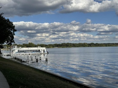 Gorgeous first floor unit with unbelievable lake views is on Lake Lawn Resort in Wisconsin - for sale on GolfHomes.com, golf home, golf lot