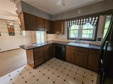This charming 3-bedroom, 2-bath home offers the potential to add on Wedgewood Cove Golf Club in Minnesota - for sale on GolfHomes.com, golf home, golf lot