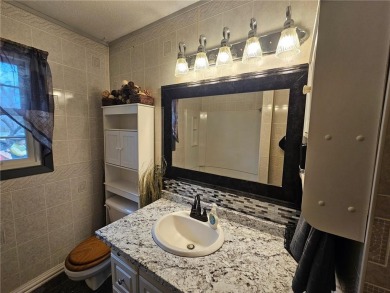 This charming 3-bedroom, 2-bath home offers the potential to add on Wedgewood Cove Golf Club in Minnesota - for sale on GolfHomes.com, golf home, golf lot