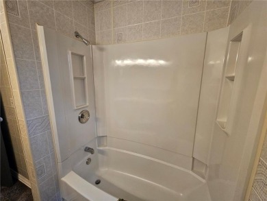 This charming 3-bedroom, 2-bath home offers the potential to add on Wedgewood Cove Golf Club in Minnesota - for sale on GolfHomes.com, golf home, golf lot