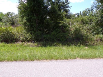 This lot is on a quiet street that would be a great place to on Live Oak Golf Club and RV Park in Florida - for sale on GolfHomes.com, golf home, golf lot