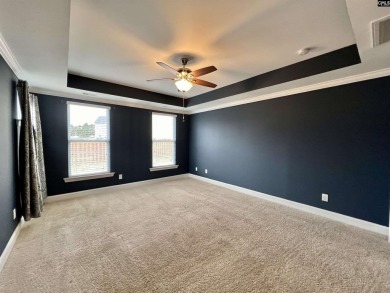This 4-bedroom home has tons of storage in an award-winning on Country Club of Lexington in South Carolina - for sale on GolfHomes.com, golf home, golf lot
