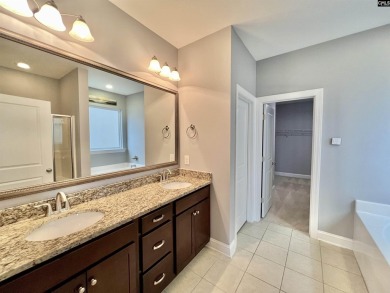 This 4-bedroom home has tons of storage in an award-winning on Country Club of Lexington in South Carolina - for sale on GolfHomes.com, golf home, golf lot