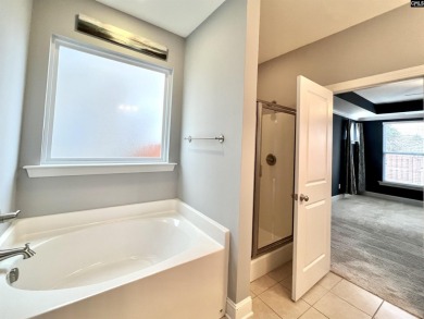 This 4-bedroom home has tons of storage in an award-winning on Country Club of Lexington in South Carolina - for sale on GolfHomes.com, golf home, golf lot