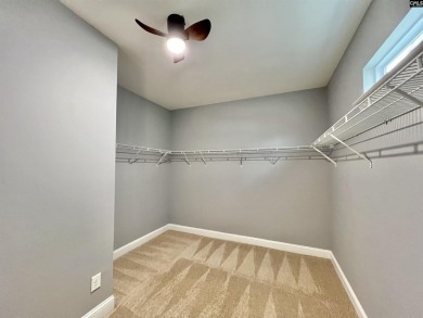 This 4-bedroom home has tons of storage in an award-winning on Country Club of Lexington in South Carolina - for sale on GolfHomes.com, golf home, golf lot