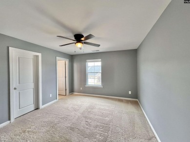 This 4-bedroom home has tons of storage in an award-winning on Country Club of Lexington in South Carolina - for sale on GolfHomes.com, golf home, golf lot