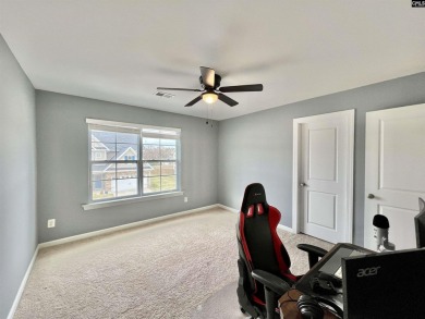 This 4-bedroom home has tons of storage in an award-winning on Country Club of Lexington in South Carolina - for sale on GolfHomes.com, golf home, golf lot
