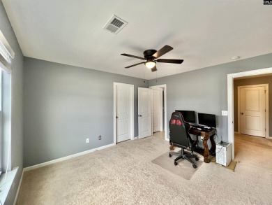 This 4-bedroom home has tons of storage in an award-winning on Country Club of Lexington in South Carolina - for sale on GolfHomes.com, golf home, golf lot