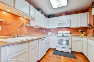 Spacious 2 bed 2 bath condo on the 4th floor with a private on Oak Meadows Golf Club in Illinois - for sale on GolfHomes.com, golf home, golf lot