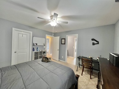 This 4-bedroom home has tons of storage in an award-winning on Country Club of Lexington in South Carolina - for sale on GolfHomes.com, golf home, golf lot