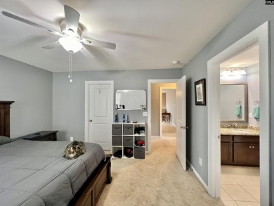 This 4-bedroom home has tons of storage in an award-winning on Country Club of Lexington in South Carolina - for sale on GolfHomes.com, golf home, golf lot