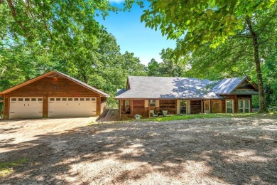 Secluded 3 bedroom 2 bath home surrounded on all 4 sides by on Holly Lake Ranch Golf Club in Texas - for sale on GolfHomes.com, golf home, golf lot