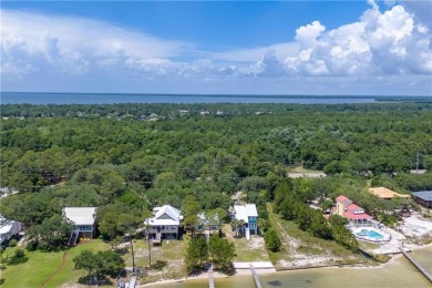Welcome to Paradise on Little Lagoon! 14752 State Highway 180 on Gulf State Park Golf Course in Alabama - for sale on GolfHomes.com, golf home, golf lot
