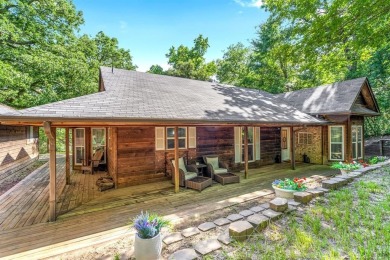 Secluded 3 bedroom 2 bath home surrounded on all 4 sides by on Holly Lake Ranch Golf Club in Texas - for sale on GolfHomes.com, golf home, golf lot