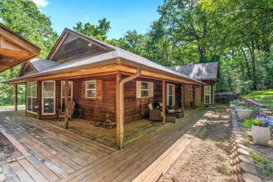 Secluded 3 bedroom 2 bath home surrounded on all 4 sides by on Holly Lake Ranch Golf Club in Texas - for sale on GolfHomes.com, golf home, golf lot