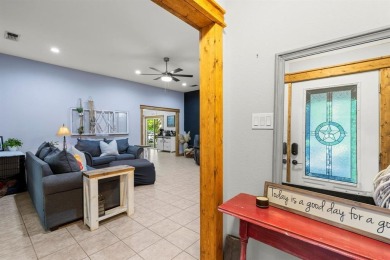 Secluded 3 bedroom 2 bath home surrounded on all 4 sides by on Holly Lake Ranch Golf Club in Texas - for sale on GolfHomes.com, golf home, golf lot