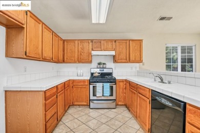 Welcome to this beautifully updated 4-bedroom, 2-bath home on Van Buskirk Municipal Golf Course in California - for sale on GolfHomes.com, golf home, golf lot