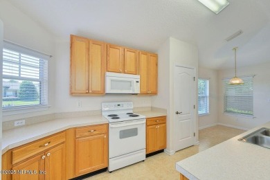 Welcome to easy, low-maintenance living in the heart of Fleming on Golf Club At Fleming Island in Florida - for sale on GolfHomes.com, golf home, golf lot