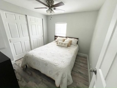Such a pleasure to move into this updated DREAM HOME located on on Del Tura Golf and Country Club in Florida - for sale on GolfHomes.com, golf home, golf lot