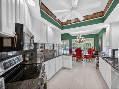 Set on a quiet cul-de-sac overlooking an 18-hole Florida style on The Florida Club in Florida - for sale on GolfHomes.com, golf home, golf lot