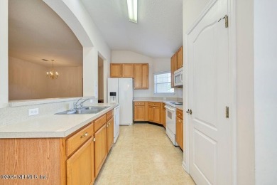 Welcome to easy, low-maintenance living in the heart of Fleming on Golf Club At Fleming Island in Florida - for sale on GolfHomes.com, golf home, golf lot