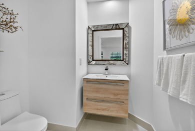 Modernly updated, move-in ready 2BR/2.5BA single-story corner on Broken Sound Golf and Club  in Florida - for sale on GolfHomes.com, golf home, golf lot