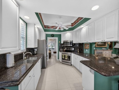 Set on a quiet cul-de-sac overlooking an 18-hole Florida style on The Florida Club in Florida - for sale on GolfHomes.com, golf home, golf lot