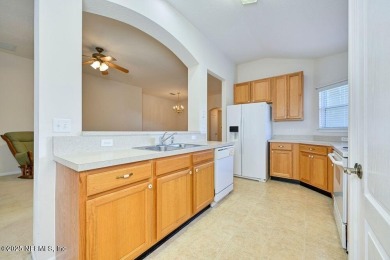Welcome to easy, low-maintenance living in the heart of Fleming on Golf Club At Fleming Island in Florida - for sale on GolfHomes.com, golf home, golf lot