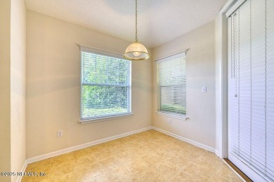 Welcome to easy, low-maintenance living in the heart of Fleming on Golf Club At Fleming Island in Florida - for sale on GolfHomes.com, golf home, golf lot