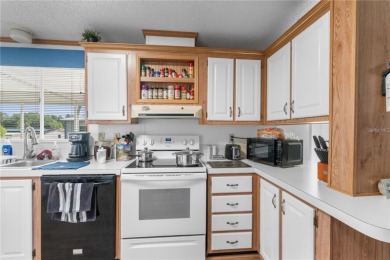 A pristine, move-in ready home in a gated 55+ community with on Brookridge Country Club in Florida - for sale on GolfHomes.com, golf home, golf lot