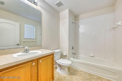 Welcome to easy, low-maintenance living in the heart of Fleming on Golf Club At Fleming Island in Florida - for sale on GolfHomes.com, golf home, golf lot