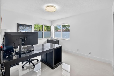 Modernly updated, move-in ready 2BR/2.5BA single-story corner on Broken Sound Golf and Club  in Florida - for sale on GolfHomes.com, golf home, golf lot