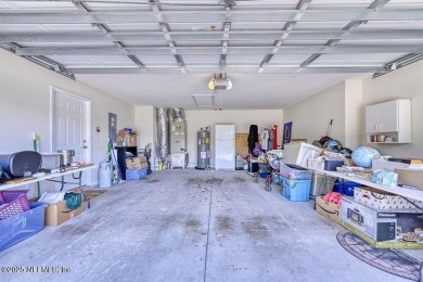 Welcome to easy, low-maintenance living in the heart of Fleming on Golf Club At Fleming Island in Florida - for sale on GolfHomes.com, golf home, golf lot