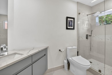 Modernly updated, move-in ready 2BR/2.5BA single-story corner on Broken Sound Golf and Club  in Florida - for sale on GolfHomes.com, golf home, golf lot