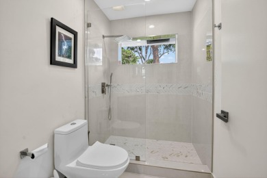 Modernly updated, move-in ready 2BR/2.5BA single-story corner on Broken Sound Golf and Club  in Florida - for sale on GolfHomes.com, golf home, golf lot