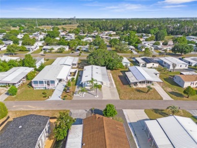 A pristine, move-in ready home in a gated 55+ community with on Brookridge Country Club in Florida - for sale on GolfHomes.com, golf home, golf lot