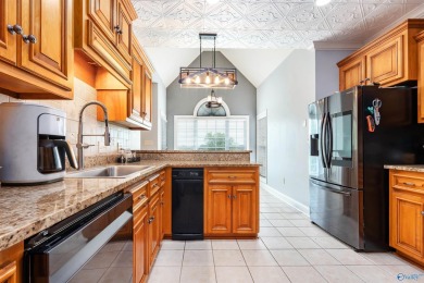 Beautiful brick home overlooking hole #9 at Canebrake Golf on Canebrake Golf Club in Alabama - for sale on GolfHomes.com, golf home, golf lot