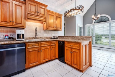 Beautiful brick home overlooking hole #9 at Canebrake Golf on Canebrake Golf Club in Alabama - for sale on GolfHomes.com, golf home, golf lot