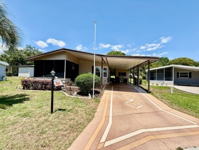 Home is located in Water Oak Country Club Estates in Lady Lake on Water Oak Country Club Estates in Florida - for sale on GolfHomes.com, golf home, golf lot