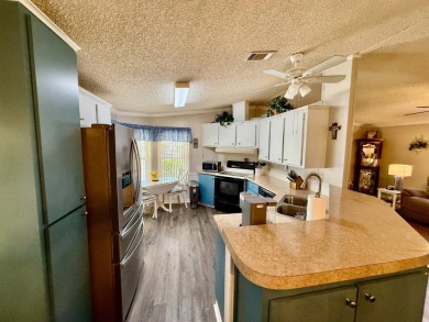 Home is located in Water Oak Country Club Estates in Lady Lake on Water Oak Country Club Estates in Florida - for sale on GolfHomes.com, golf home, golf lot