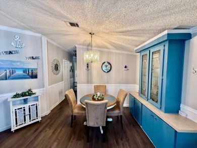 Home is located in Water Oak Country Club Estates in Lady Lake on Water Oak Country Club Estates in Florida - for sale on GolfHomes.com, golf home, golf lot