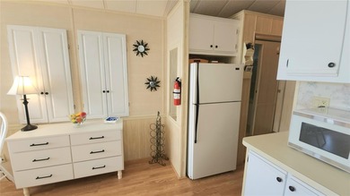 CHEERFUL HOME IN ACTIVE 55+ COMMUNITY! This one bed, 1 1/2 bath on River Run Golf Links in Florida - for sale on GolfHomes.com, golf home, golf lot